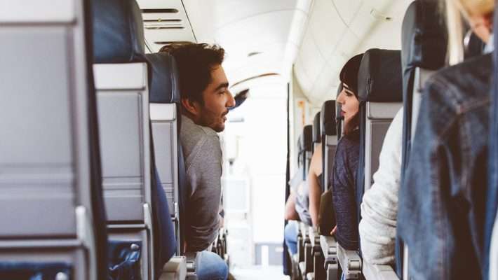 Web Blog two passengers inside plane aerospace travel